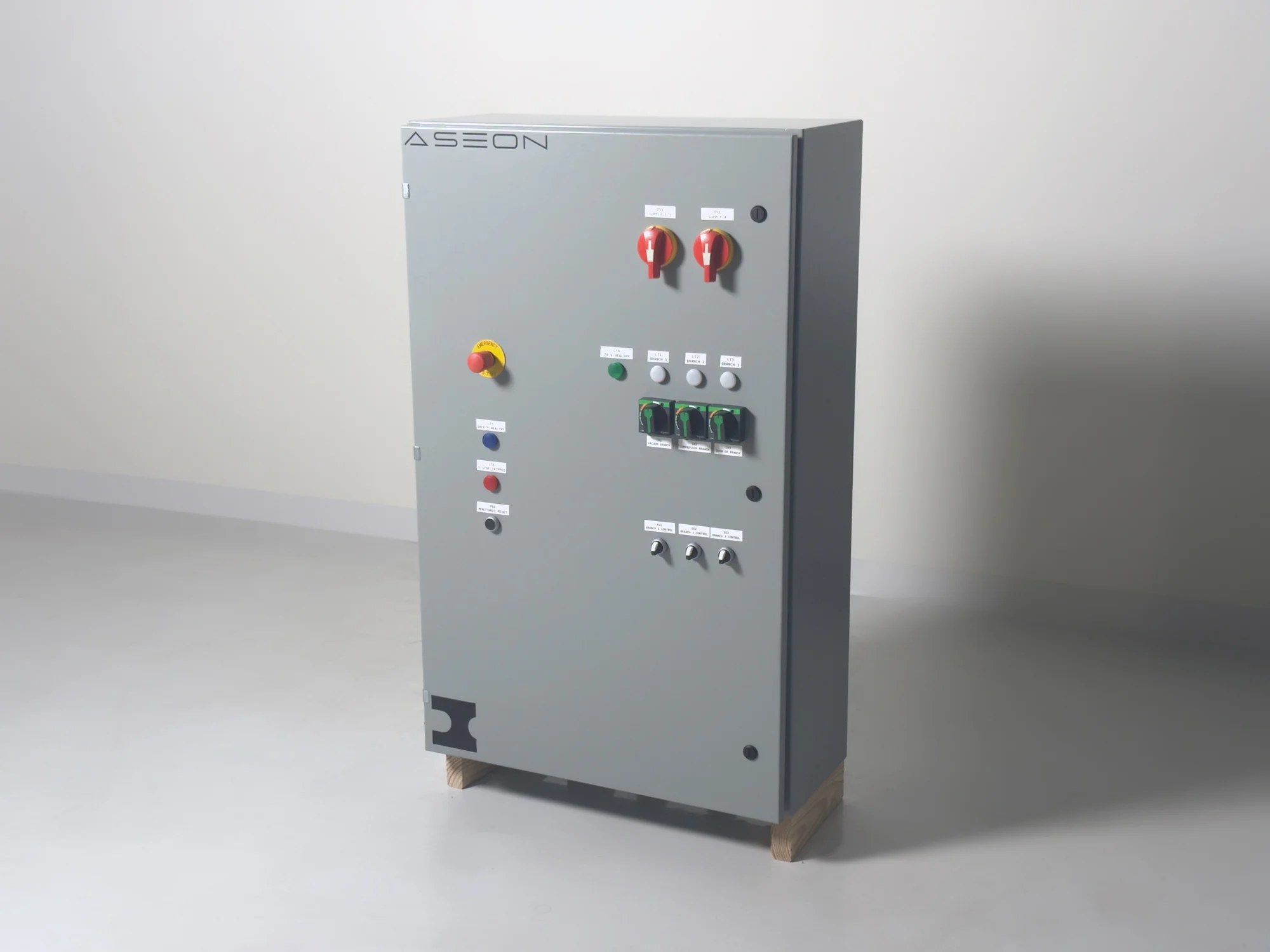 Aseon Labs' robotic servicing pod electrical panel with door-mounted disconnects, switches, and indicators.