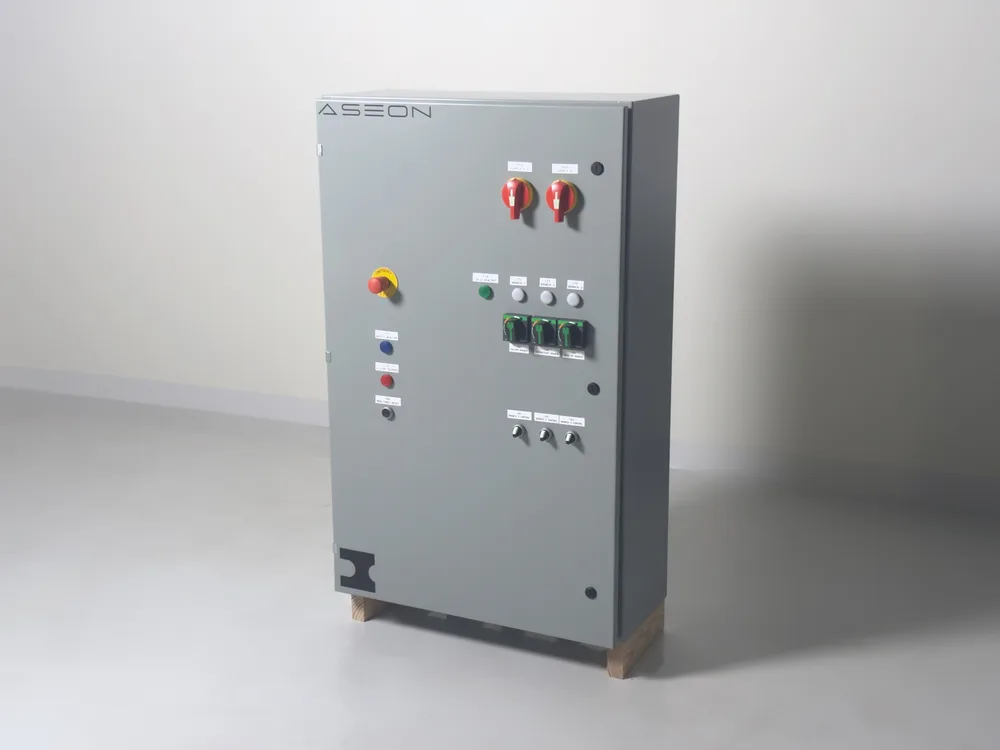 Aseon Labs' robotic servicing pod electrical panel with door-mounted disconnects, switches, and indicators.