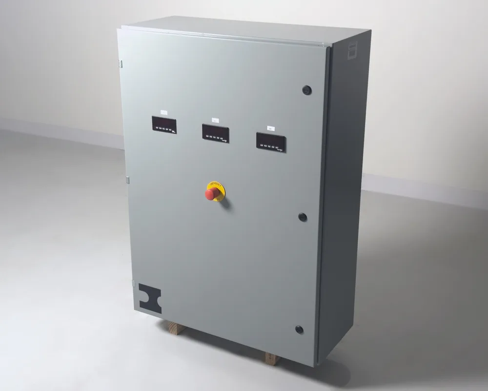 Stone Power's finished turbine control panel with the Stone Power logo and door-mounted instruments.